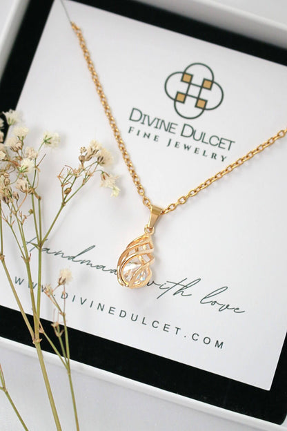 Delicate Gold Cage Pendant Necklace with Crystal Teardrop